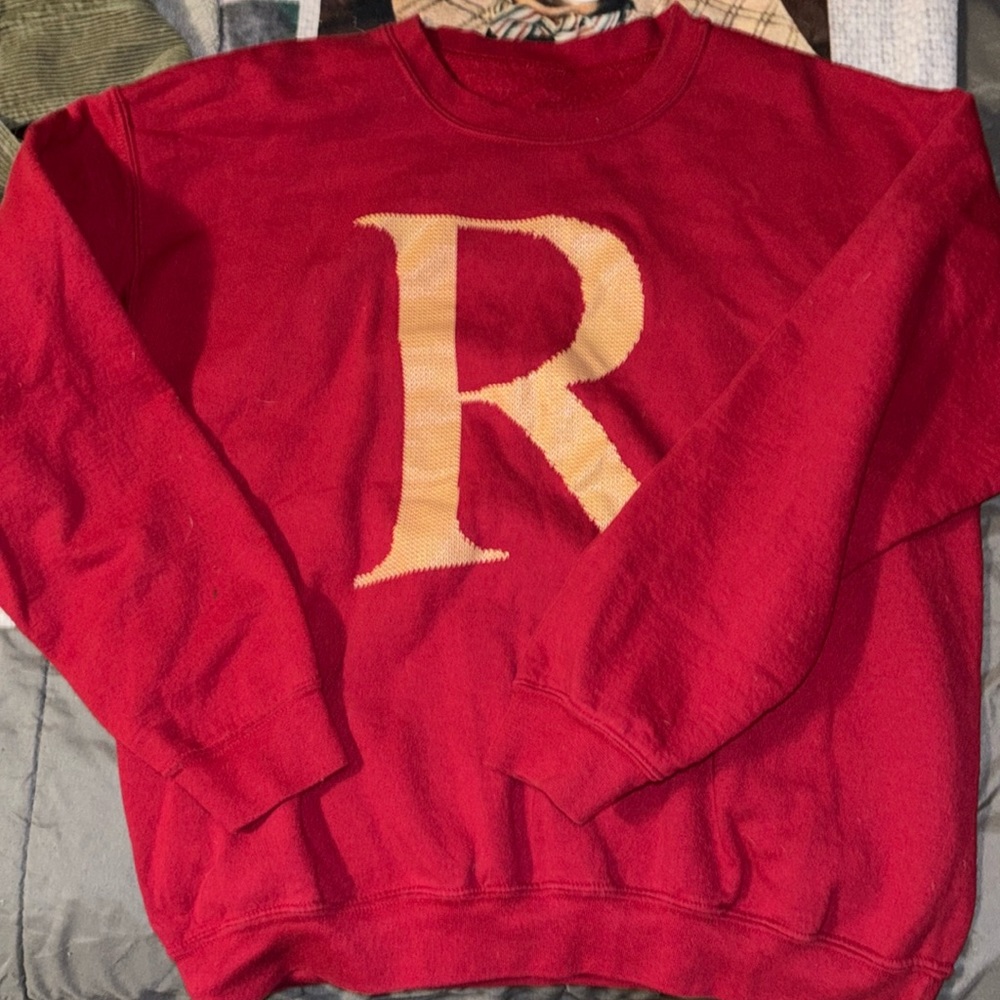 Harry Potter themed sweatshirt.